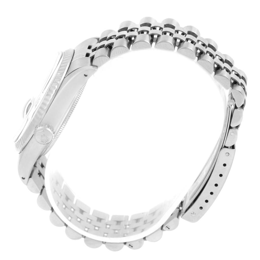 This image shows a side view of the case and the bracelet of a Rolex Vintage Collection 16014 Men's Stainless Steel Silver Dial 16014 Men's Stainless Steel Silver Dial watch.