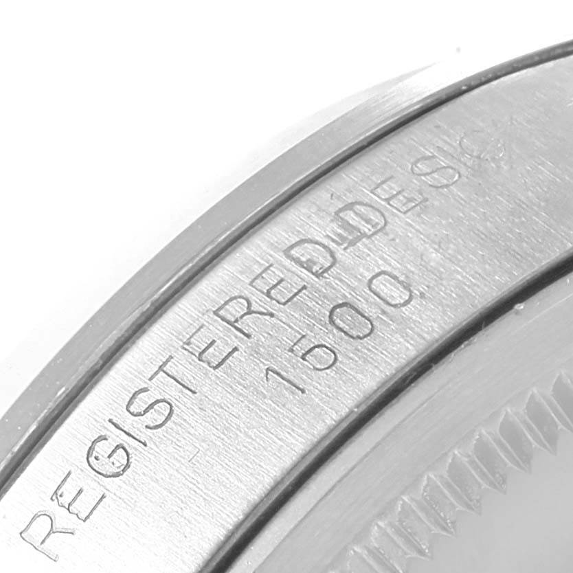 The image shows a close-up of the case back edge with engraved text on the Rolex Vintage Collection 1500 Men's Stainless Steel Silver Dial 1500 Men's Stainless Steel Silver Dial model.