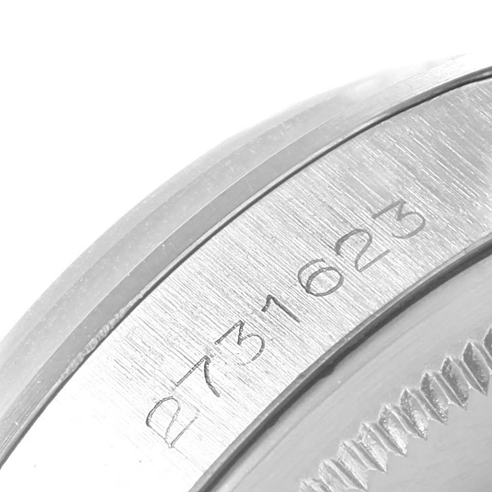 This image shows a close-up of the watch back and serial number of the Vintage Collection model by Rolex.