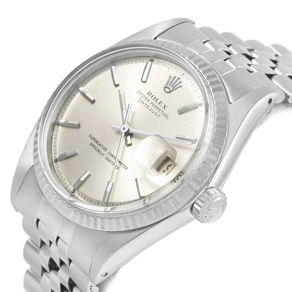 The image displays a Rolex Vintage Collection 1601 Men's Stainless Steel Silver Dial 1601 Men's Stainless Steel Silver Dial Oyster Perpetual Datejust watch, focusing on the face, crown, and part of the bracelet from an angle.