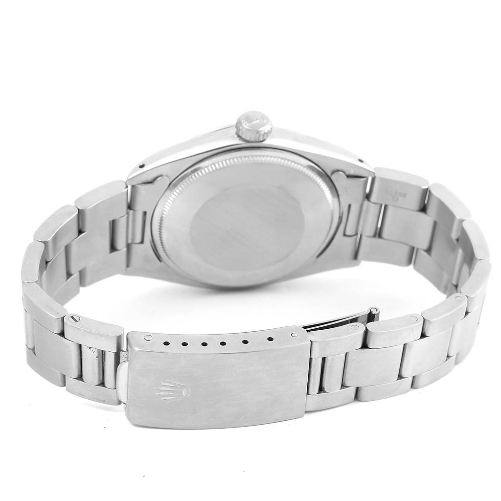 The image shows the back and bracelet clasp of a Rolex Vintage Collection 1500 Men's Stainless Steel Silver Dial 1500 Men's Stainless Steel Silver Dial watch.