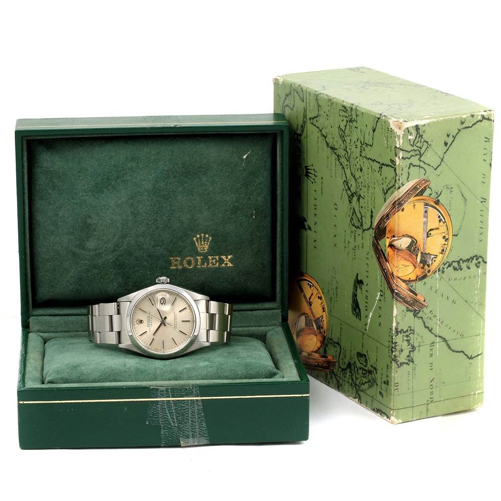 The Rolex Vintage Collection 1500 Men's Stainless Steel Silver Dial 1500 Men's Stainless Steel Silver Dial watch is shown from the front, resting in its green box with the outer box also visible.