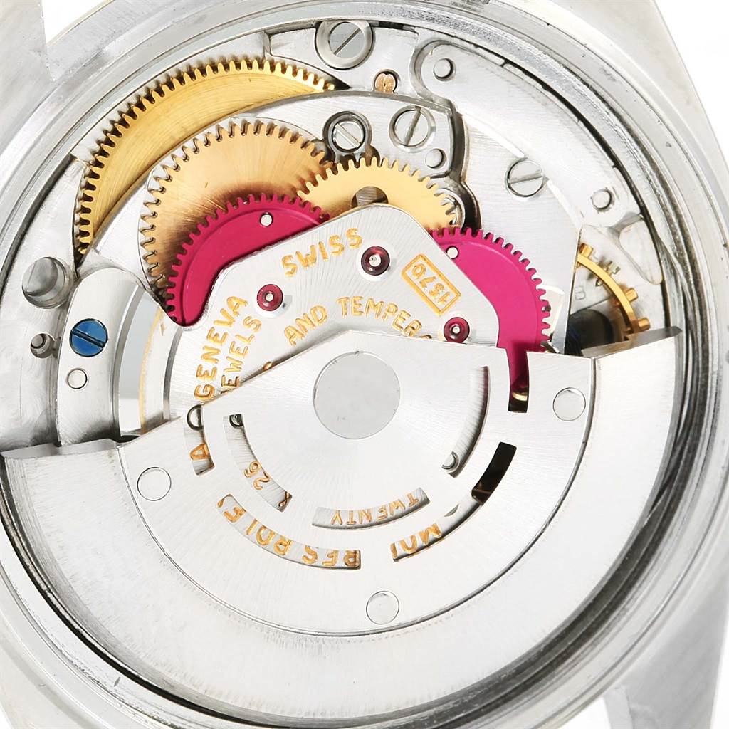 This image shows the internal mechanism and gears of a Vintage Collection Rolex watch.