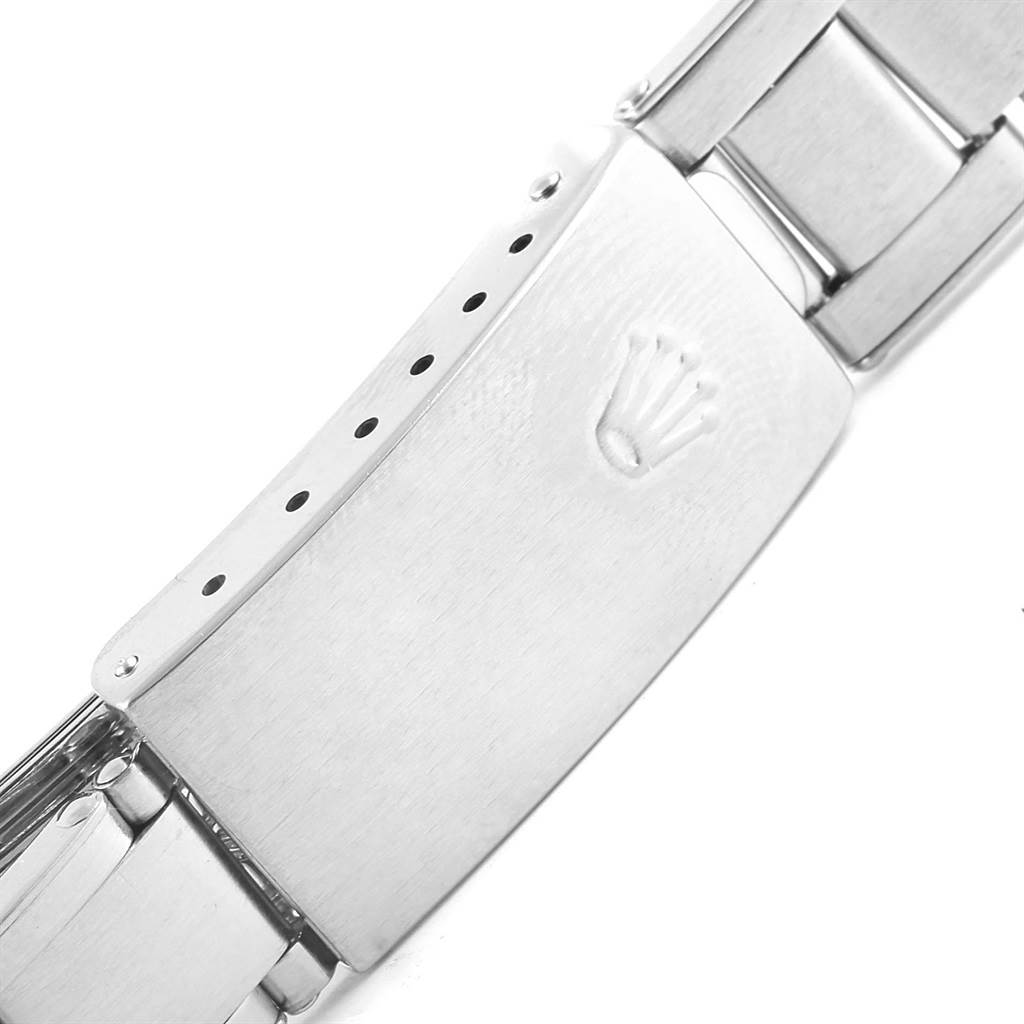 This image shows the clasp of a Rolex Vintage Collection 6694 Men's Stainless Steel Black Dial 6694 Men's Stainless Steel Black Dial watch from a close-up angle.