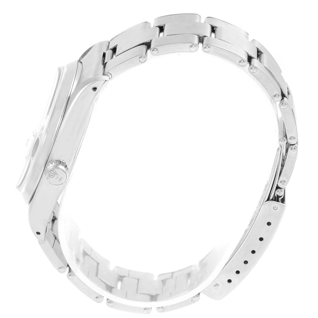 The image shows a side view of the Rolex Vintage Collection 6694 Men's Stainless Steel Black Dial 6694 Men's Stainless Steel Black Dial watch, focusing on its metallic bracelet and case.