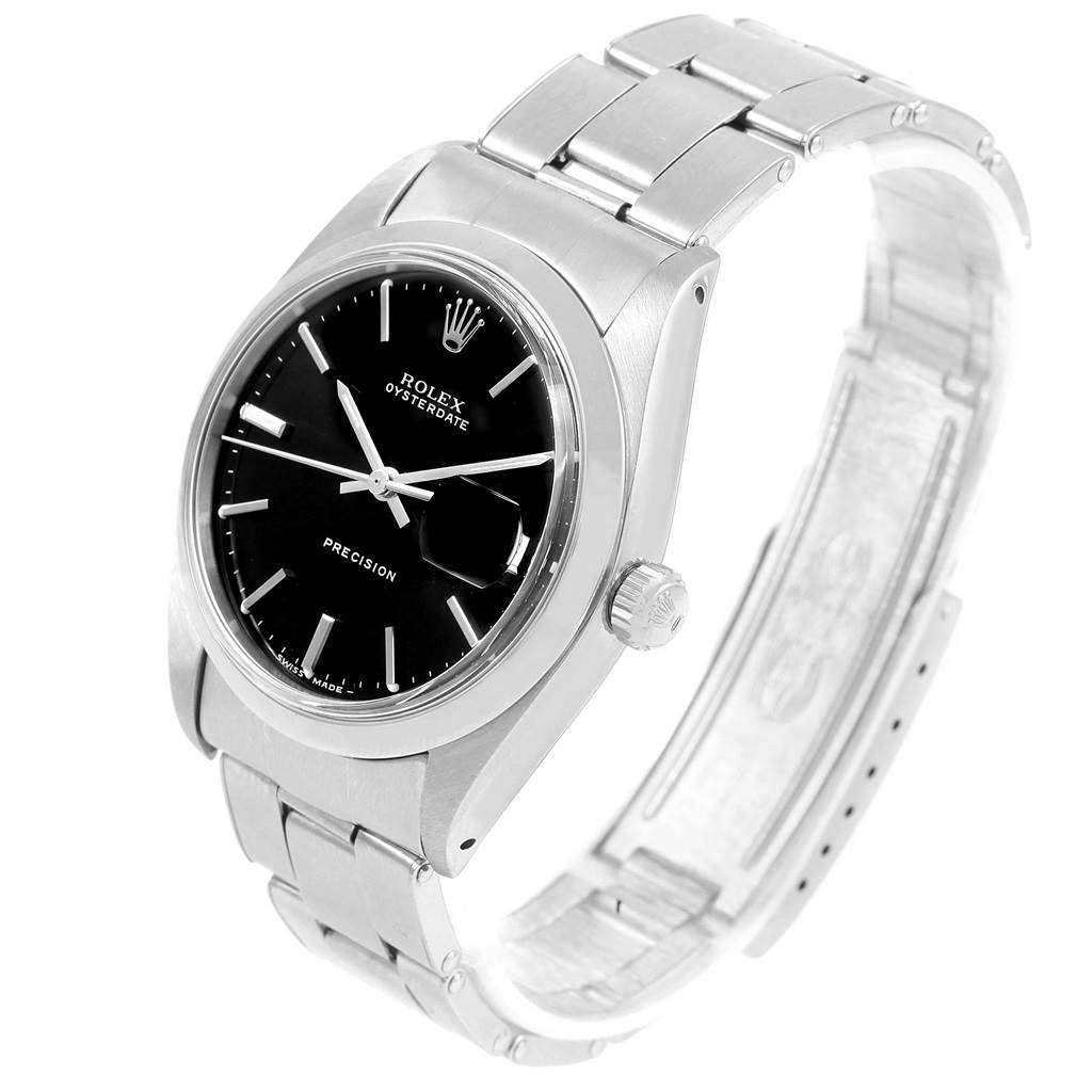 The image shows a side angle of the Rolex Vintage Collection 6694 Men's Stainless Steel Black Dial 6694 Men's Stainless Steel Black Dial Oysterdate watch, highlighting the face, crown, and bracelet.