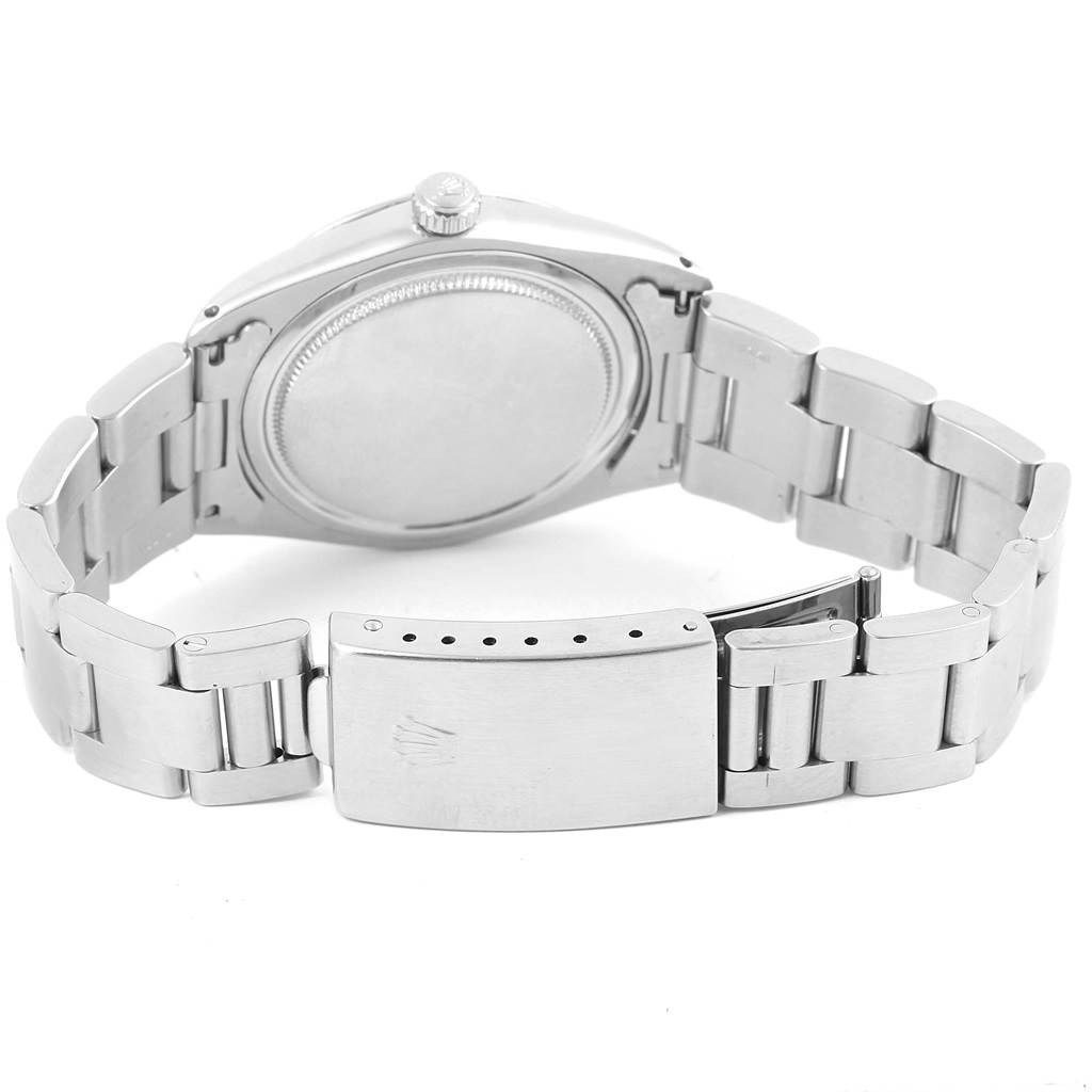 The image shows the back of the case and the bracelet, including the clasp, of a Rolex Vintage Collection 6694 Men's Stainless Steel Black Dial 6694 Men's Stainless Steel Black Dial model watch.