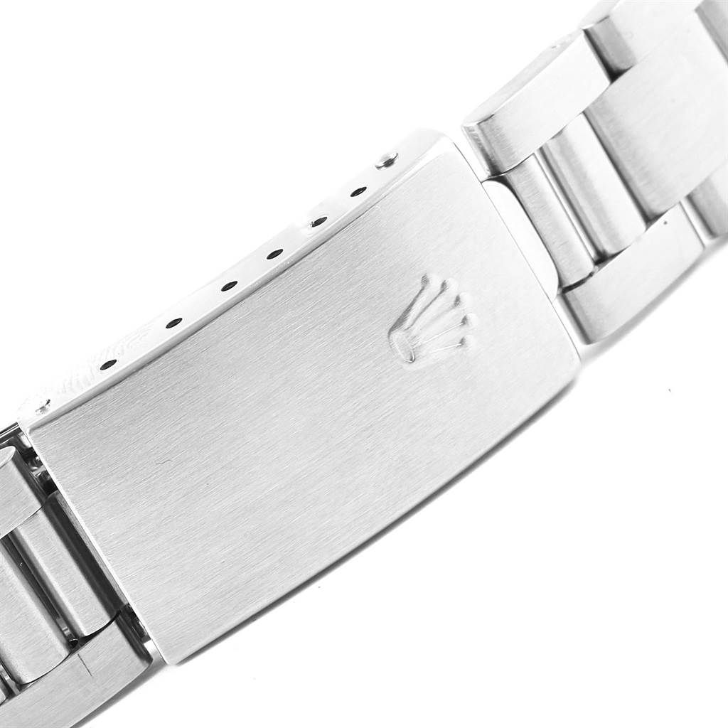 The image shows a close-up of the clasp on a Rolex Vintage Collection 6694 Men's Stainless Steel Black Dial 6694 Men's Stainless Steel Black Dial watch bracelet.