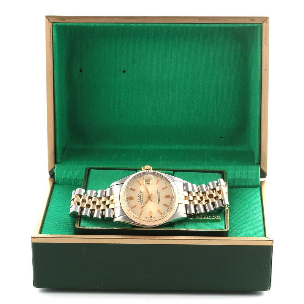 The photo shows a Rolex Vintage Collection 16013 Men's Stainless Steel Silver Dial 16013 Men's Stainless Steel Silver Dial watch lying flat in an open green display box.