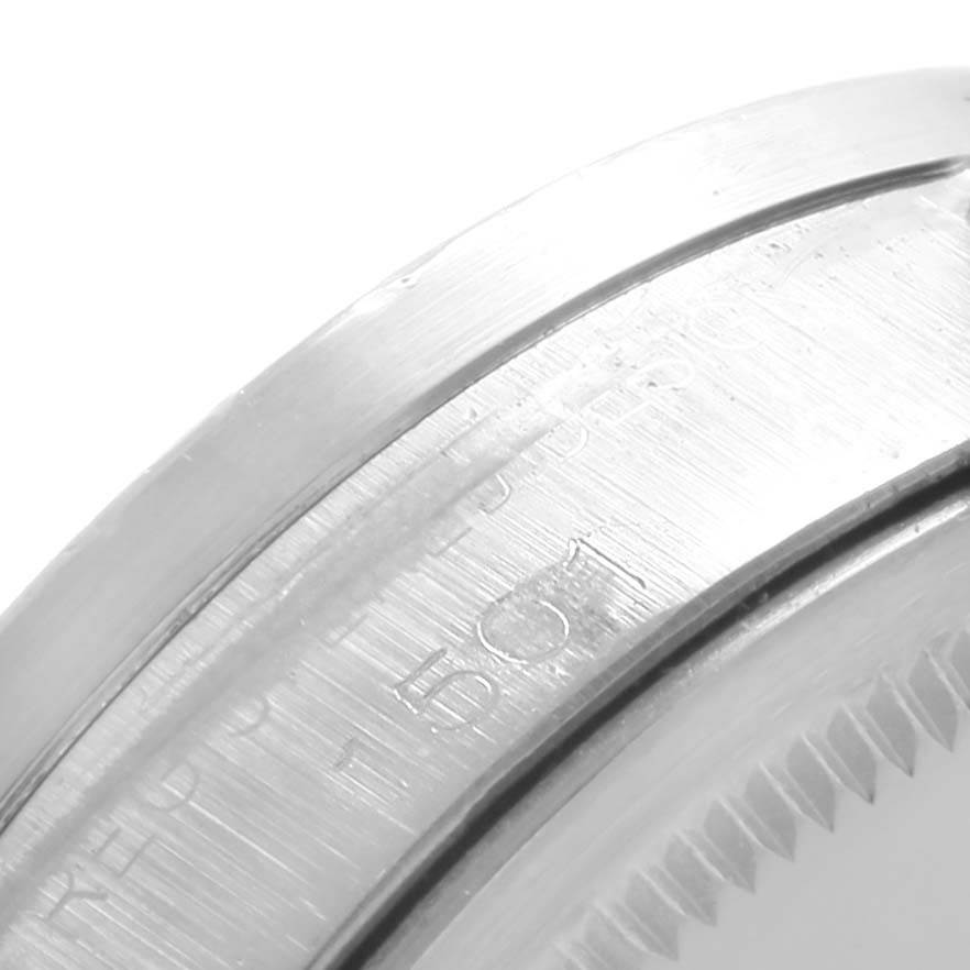 The image shows a close-up angle of the case back and edge of a Rolex Vintage Collection 1501 Men's Stainless Steel Silver Dial 1501 Men's Stainless Steel Silver Dial watch.