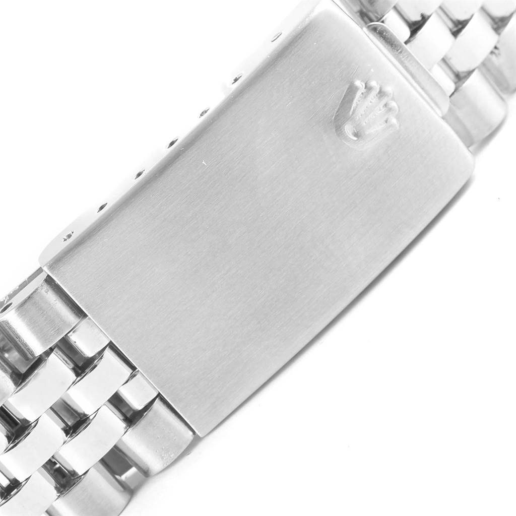 The image shows a clasp and part of the bracelet of a Rolex Vintage Collection 1601 Men's Stainless Steel Silver Dial 1601 Men's Stainless Steel Silver Dial watch, viewed from the top.