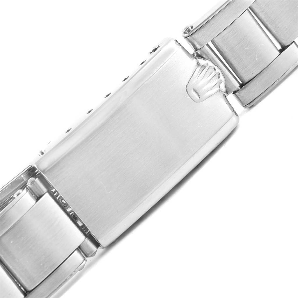 The image shows a close-up of the clasp and part of the bracelet on a Rolex Vintage Collection 1500 Men's Stainless Steel Silver Dial 1500 Men's Stainless Steel Silver Dial model watch.