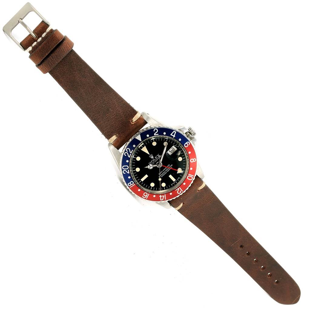 This image shows the Vintage Collection model by Rolex from a top view, highlighting the face, bezel, band, and buckle.