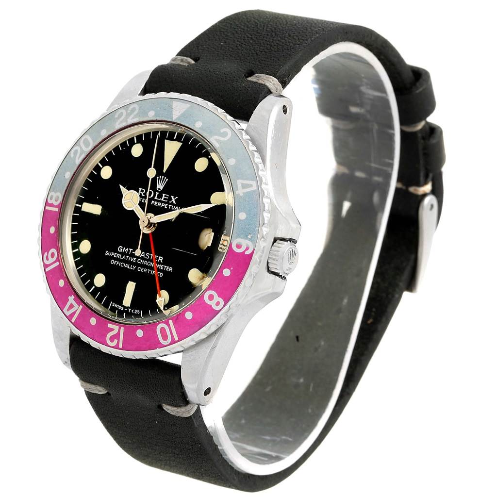 The image shows a Rolex Vintage Collection 1675 Men's Stainless Steel Black Dial 1675 Men's Stainless Steel Black Dial GMT-Master watch at a three-quarter angle, highlighting its bezel, dial, and leather strap.