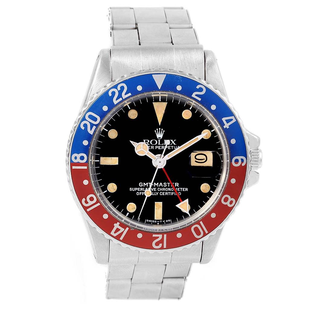 The image shows a front view of a Vintage Collection Rolex GMT-Master watch with a blue and red bezel and stainless steel bracelet.