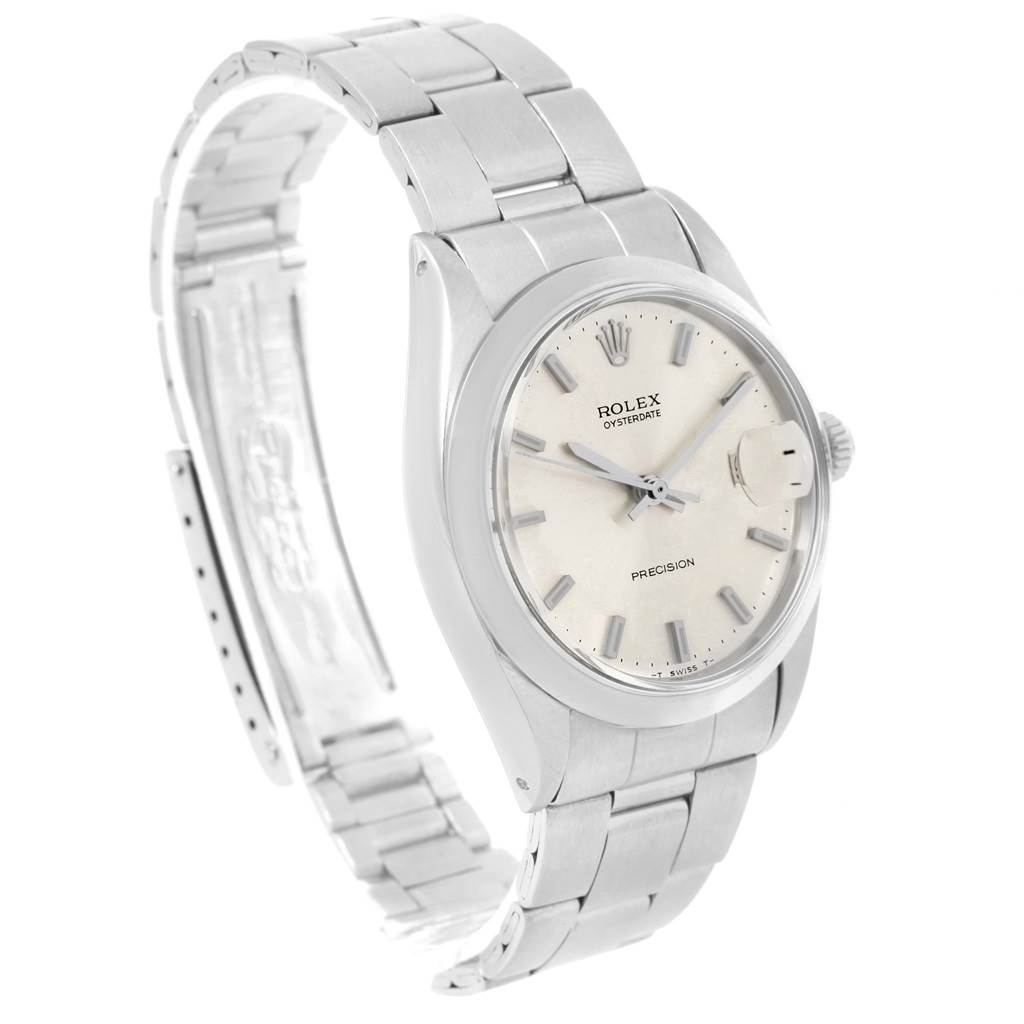 The image shows a side angle view of a Rolex Vintage Collection 6694 Men's Stainless Steel Silver Dial 6694 Men's Stainless Steel Silver Dial watch, highlighting its metal band and face with the Rolex logo.
