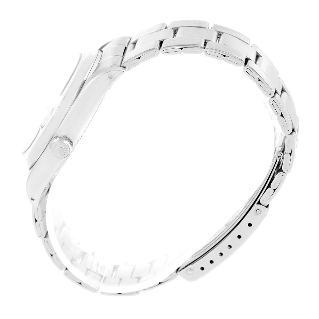 The image shows a side view of a Rolex Vintage Collection 6694 Men's Stainless Steel Silver Dial 6694 Men's Stainless Steel Silver Dial watch, highlighting the bracelet and case.