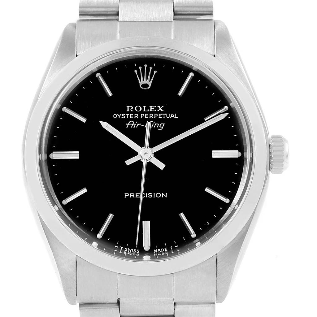 The image shows a frontal view of the Vintage Collection Rolex Oyster Perpetual Air-King watch, featuring its black dial and silver bracelet.