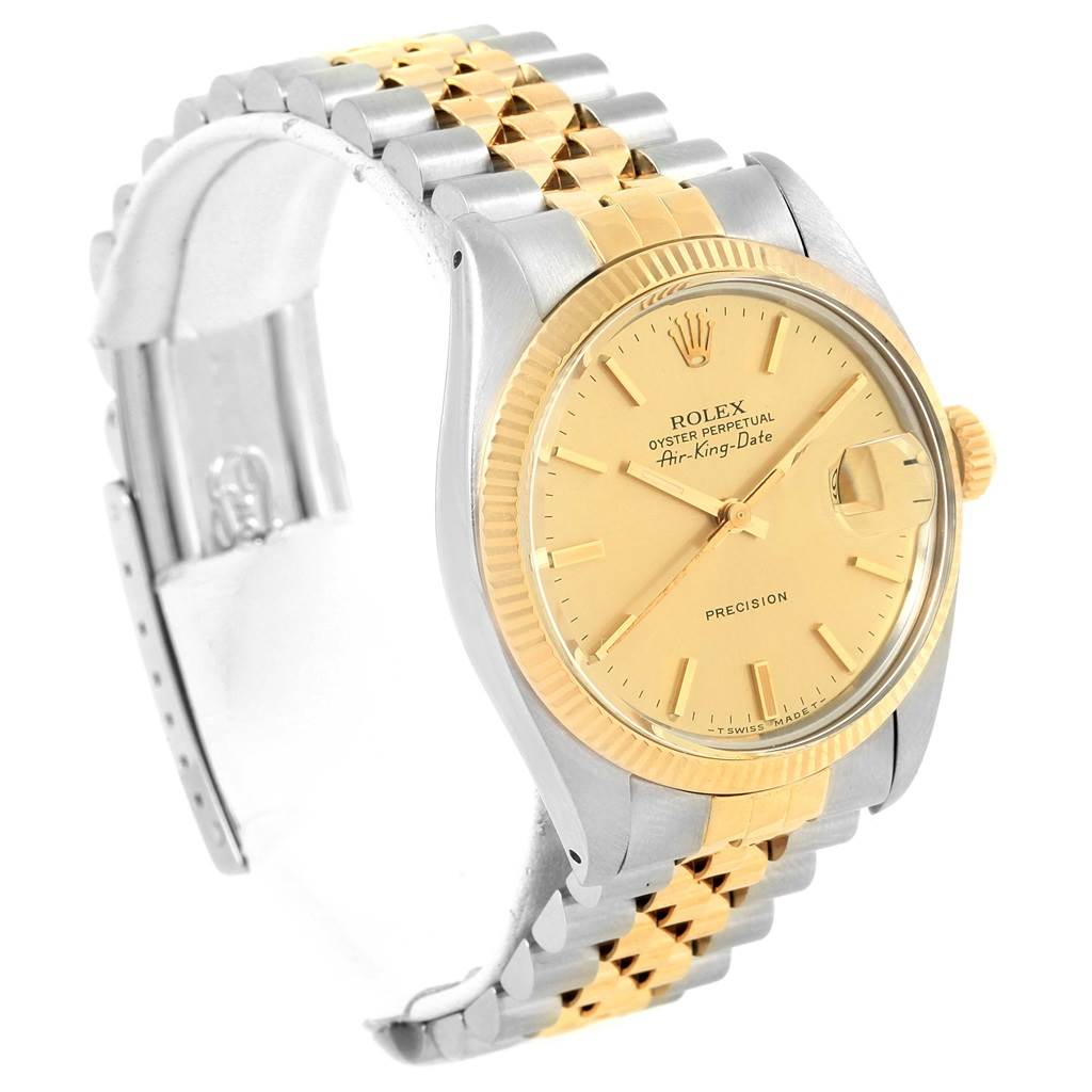 This Rolex Vintage Collection 5701 Men's Steel and Gold (two tone) Champagne Dial 5701 Men's Steel and Gold (two tone) Champagne Dial model is shown from a three-quarter angle, displaying the face, bezel, crown, and bracelet.