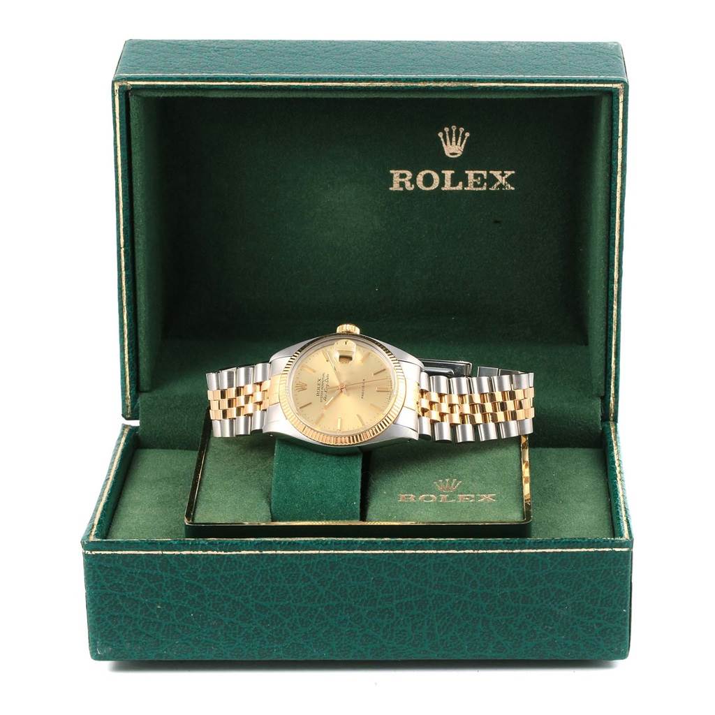 The Rolex Vintage Collection 5701 Men's Steel and Gold (two tone) Champagne Dial 5701 Men's Steel and Gold (two tone) Champagne Dial watch is shown from a front angle within its green display box.