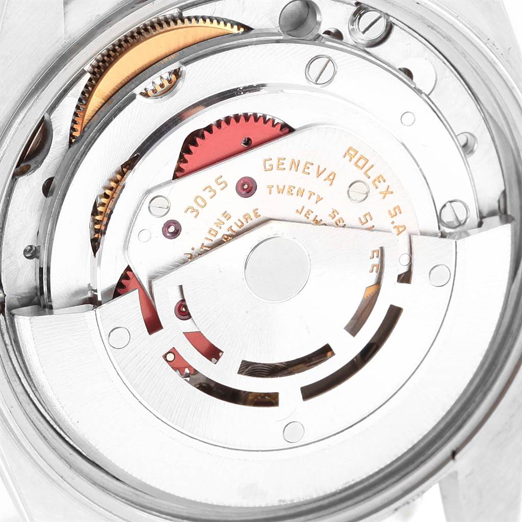 The image shows a close-up of the movement mechanism of the Vintage Collection model by Rolex.