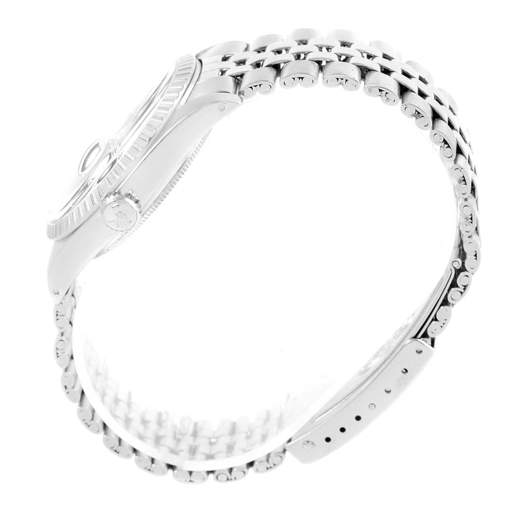 The image shows a side view of the Rolex Vintage Collection 16030 Men's Stainless Steel Blue Dial 16030 Men's Stainless Steel Blue Dial watch featuring its case, bezel, crown, and bracelet.