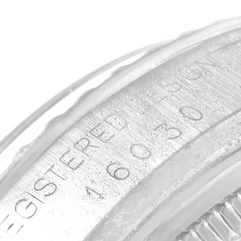 This image shows a close-up of the engraved side of a Rolex Vintage Collection 16030 Men's Stainless Steel Blue Dial 16030 Men's Stainless Steel Blue Dial watch case.