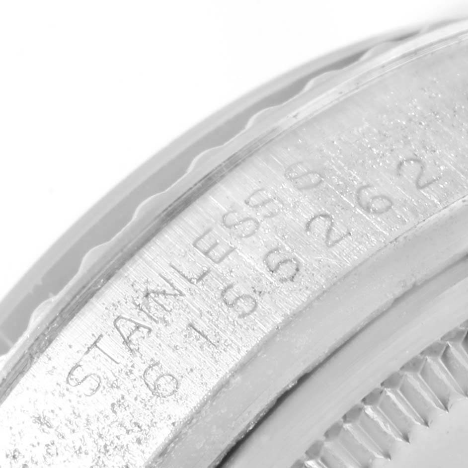 The image shows a close-up view of the case side and bezel of a Rolex Vintage Collection 16030 Men's Stainless Steel Blue Dial 16030 Men's Stainless Steel Blue Dial watch, focusing on the engraved details.