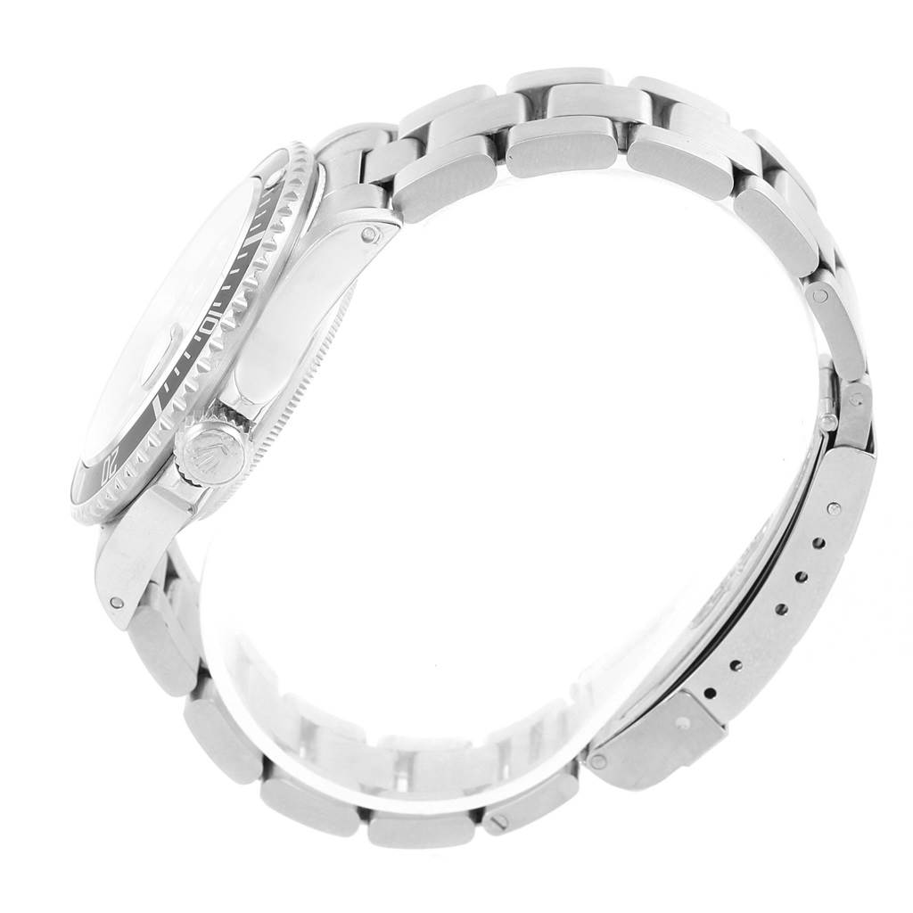 This image shows a side view of a Rolex Vintage Collection 16800 Men's Stainless Steel Black Dial 16800 Men's Stainless Steel Black Dial model, highlighting the case, crown, bezel, and bracelet.