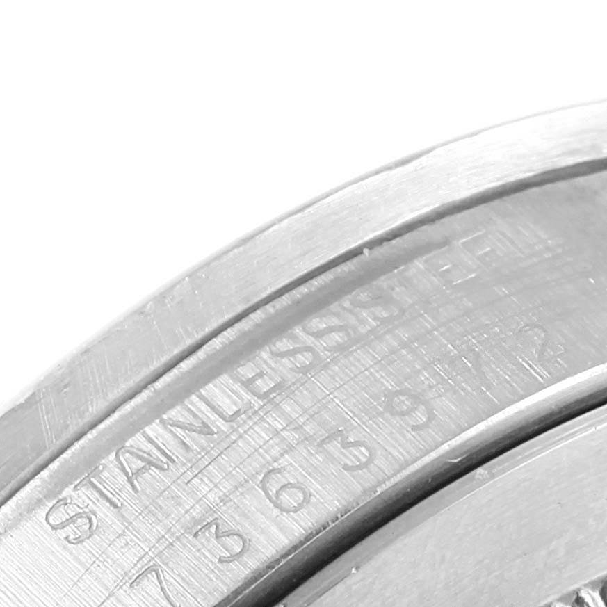 This close-up image shows the stainless steel back casing of the Rolex Vintage Collection 1655 Men's Stainless Steel Black Dial 1655 Men's Stainless Steel Black Dial model.