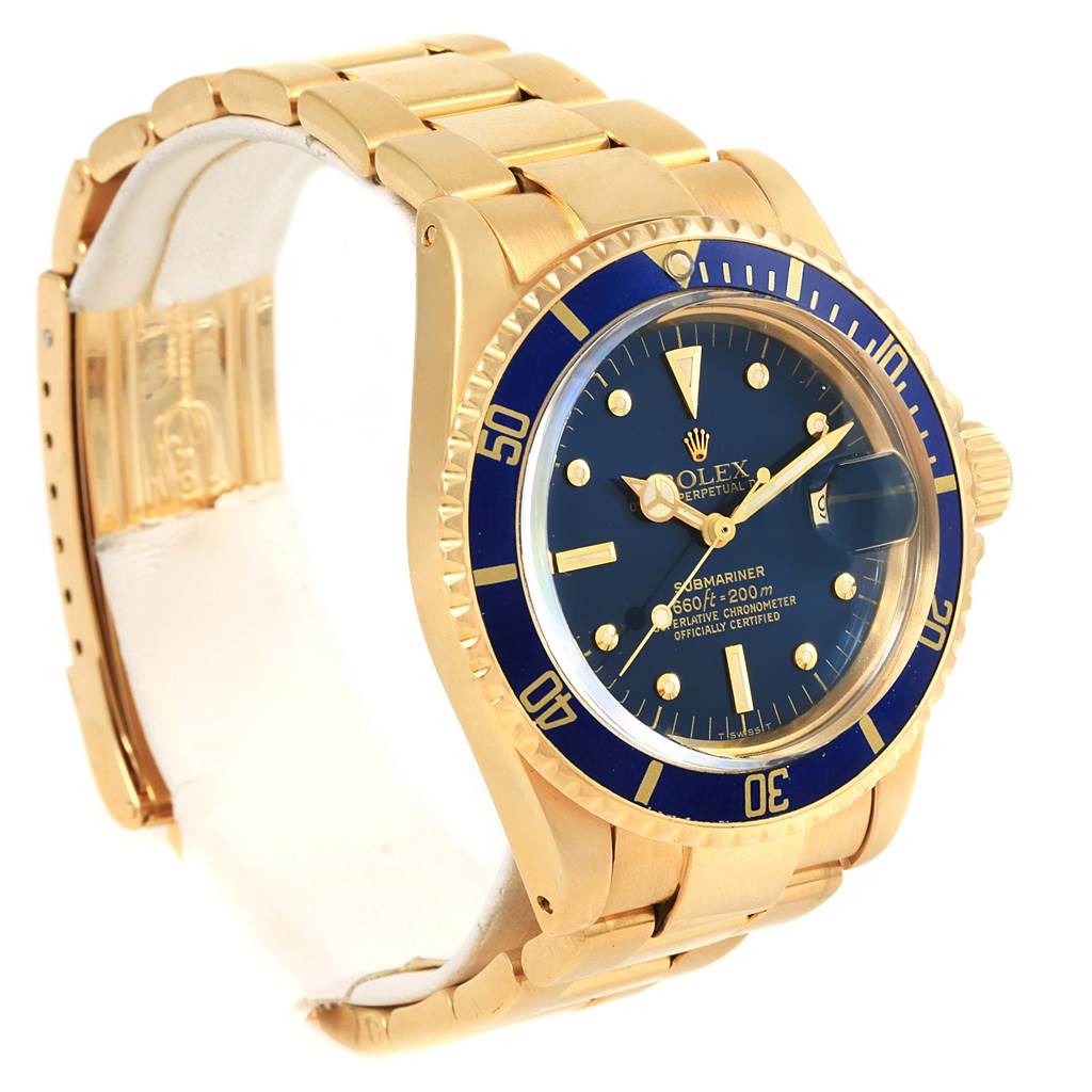 The image shows a Rolex Vintage Collection 1680 Men's Yellow Gold Blue Dial 1680 Men's Yellow Gold Blue Dial watch from a front-side angle, displaying the bracelet, bezel, and watch face.