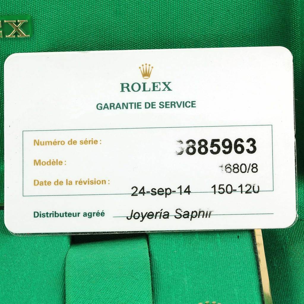 This image shows the service warranty card for a Rolex Vintage Collection 1680 Men's Yellow Gold Blue Dial 1680 Men's Yellow Gold Blue Dial watch, including serial and model numbers.