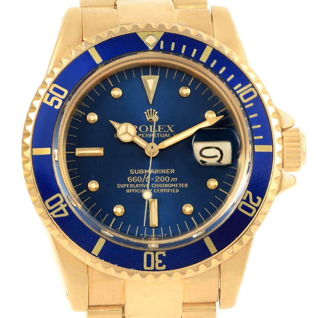 The image shows a front view of the Rolex Vintage Collection 1680 Men's Yellow Gold Blue Dial 1680 Men's Yellow Gold Blue Dial Submariner watch, highlighting the dial, bezel, and bracelet.