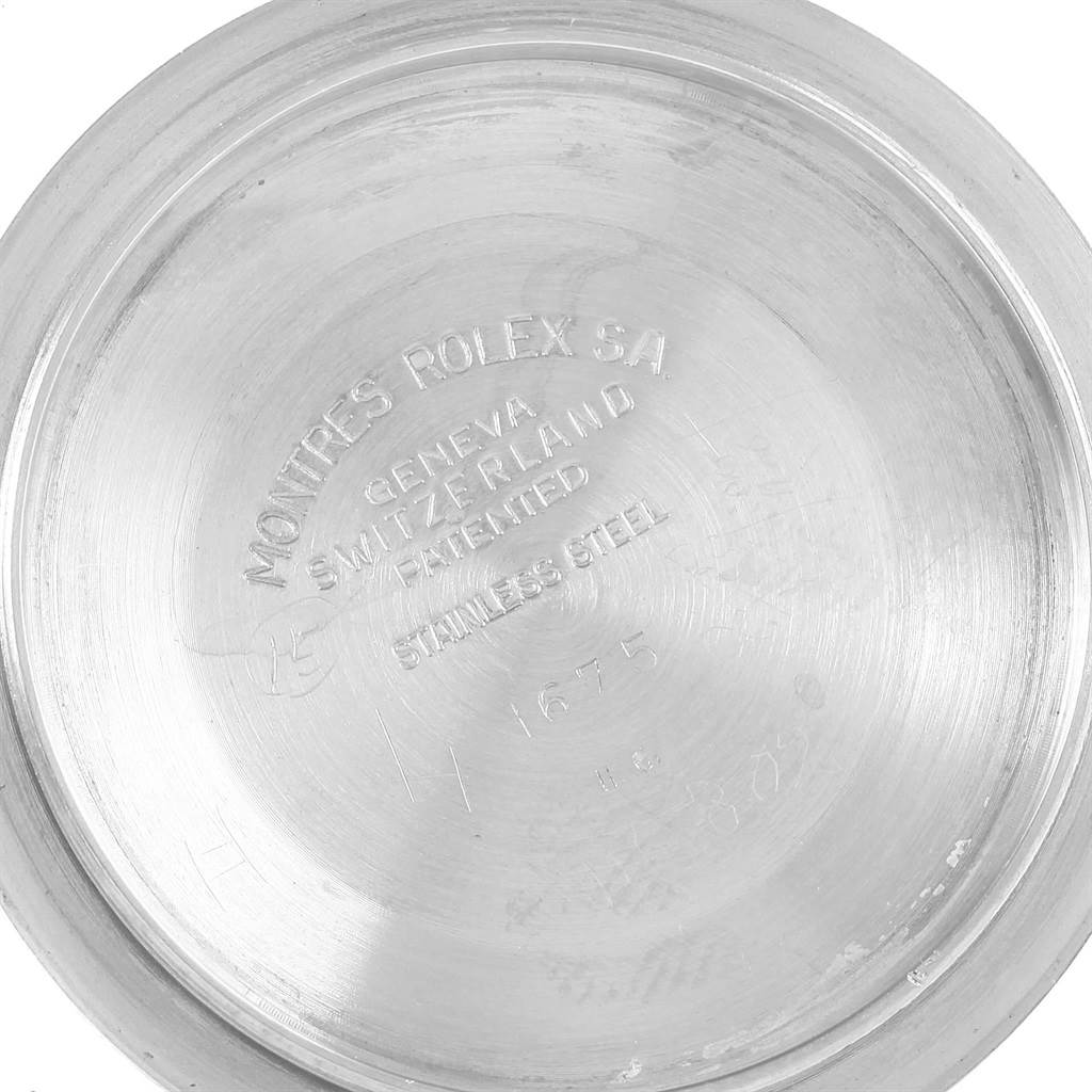 This image shows the interior of the case back of a Vintage Collection Rolex watch from a top-down view.