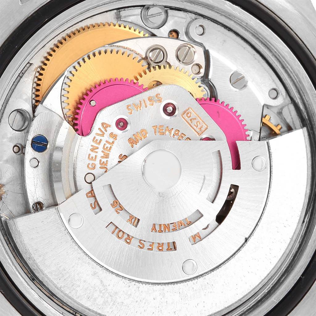 This close-up angle shows the intricate internal mechanism of a Rolex Vintage Collection 1675 Men's Stainless Steel Black Dial 1675 Men's Stainless Steel Black Dial model.