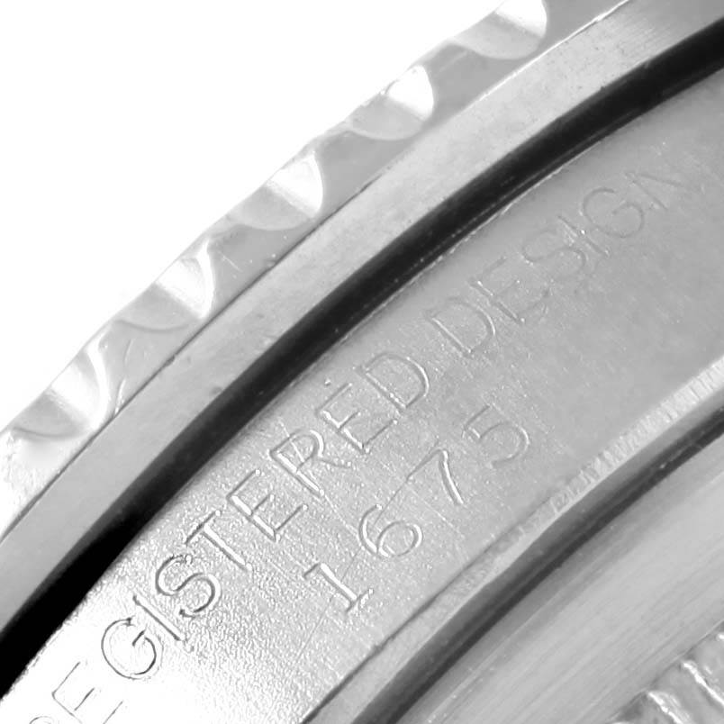 The image shows a close-up view of the bezel and side engraving on the Rolex Vintage Collection 1675 Men's Stainless Steel Black Dial 1675 Men's Stainless Steel Black Dial model.