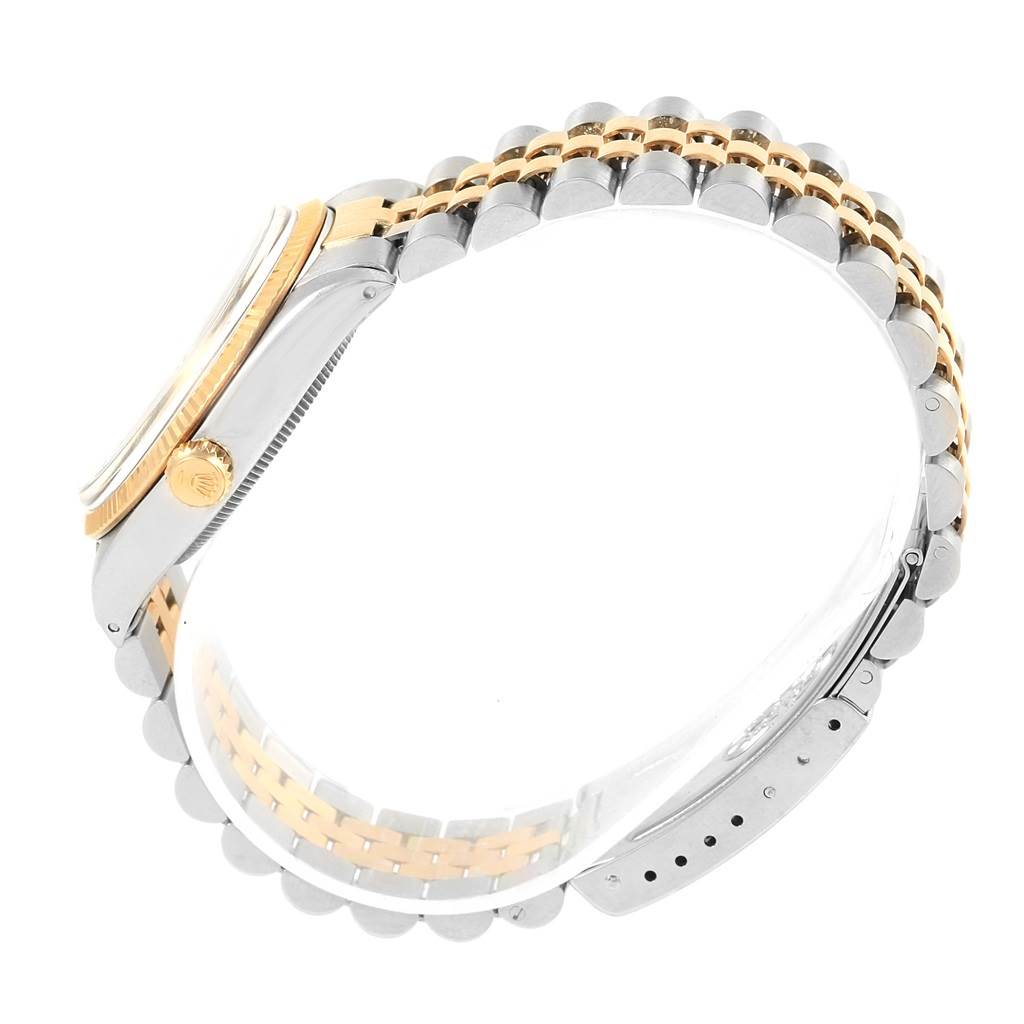 The image shows a side view of a Vintage Collection Rolex watch, highlighting its crown, bezel, and two-tone bracelet.