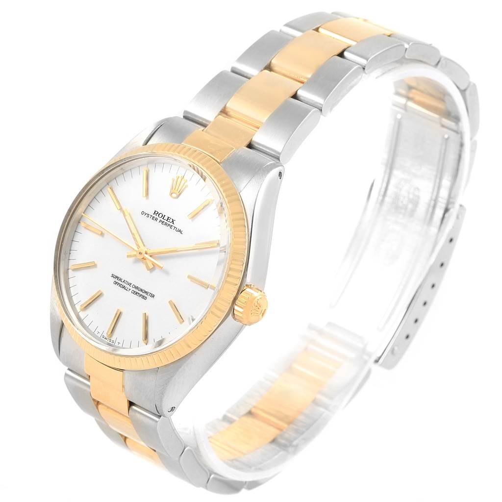 The Rolex Vintage Collection 1005 Men's Steel and Gold (two tone) White Dial 1005 Men's Steel and Gold (two tone) White Dial model is shown at a slight angle, highlighting its gold and silver bracelet, dial, and crown.