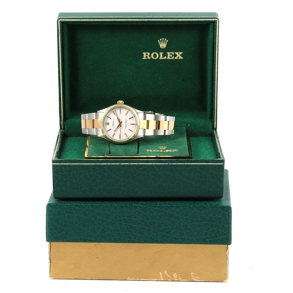 The Rolex Vintage Collection 1005 Men's Steel and Gold (two tone) White Dial 1005 Men's Steel and Gold (two tone) White Dial watch is shown in its open box, displaying the watch face and two-tone bracelet.
