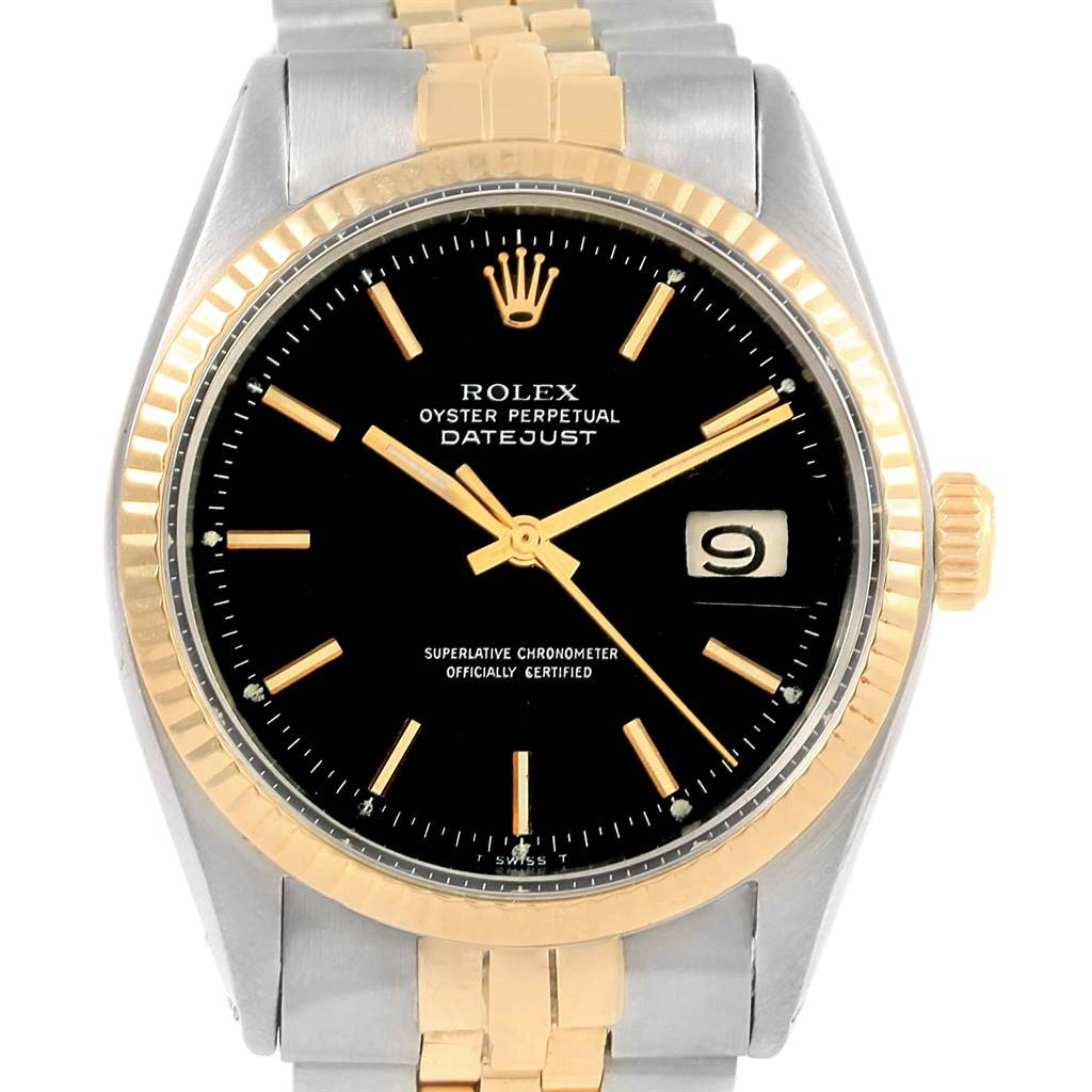 The image shows a front view of the Rolex Vintage Collection 1600 Men's Stainless Steel Black Dial 1600 Men's Stainless Steel Black Dial Datejust watch, featuring a black dial and two-tone metal bracelet.