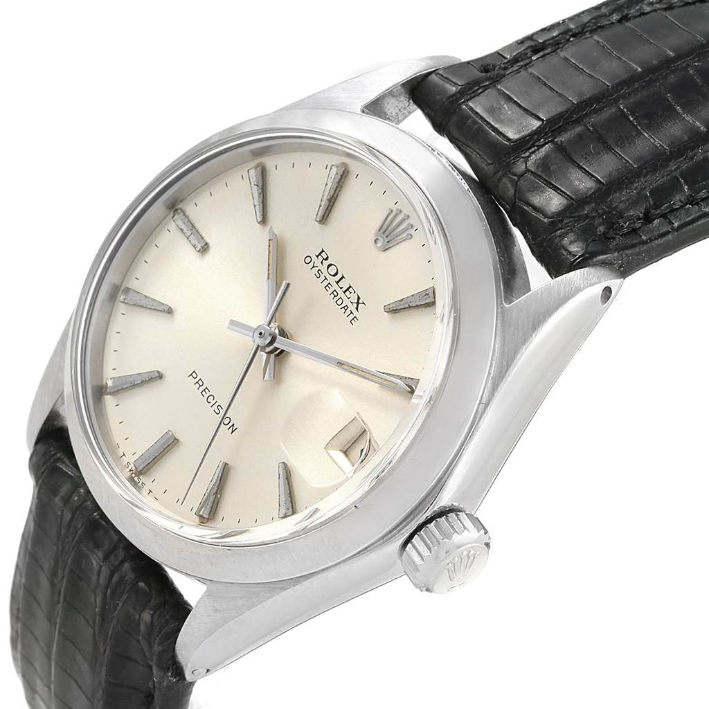 The image shows a close-up angled view of a Rolex Vintage Collection 6466 Men's Stainless Steel Silver Dial 6466 Men's Stainless Steel Silver Dial Oysterdate watch, highlighting the dial, crown, and strap.