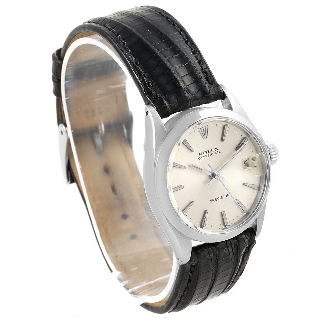 The image shows a side and front view of the Rolex Vintage Collection 6466 Men's Stainless Steel Silver Dial 6466 Men's Stainless Steel Silver Dial model watch, highlighting its face, case, and leather strap.