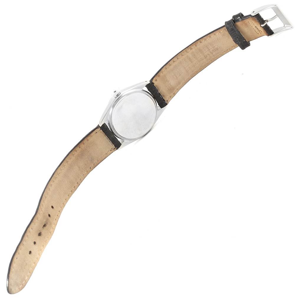 The Rolex Vintage Collection 6466 Men's Stainless Steel Silver Dial 6466 Men's Stainless Steel Silver Dial watch is shown from the back, displaying the case back and leather strap.