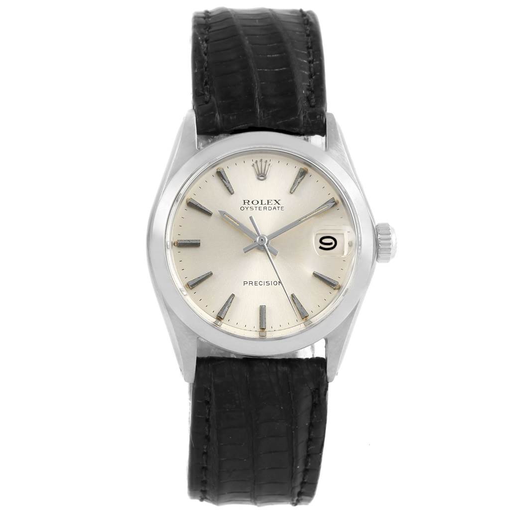 The image shows a front view of the Rolex Oysterdate Precision watch from the Vintage Collection, displaying the dial, hands, and date window.