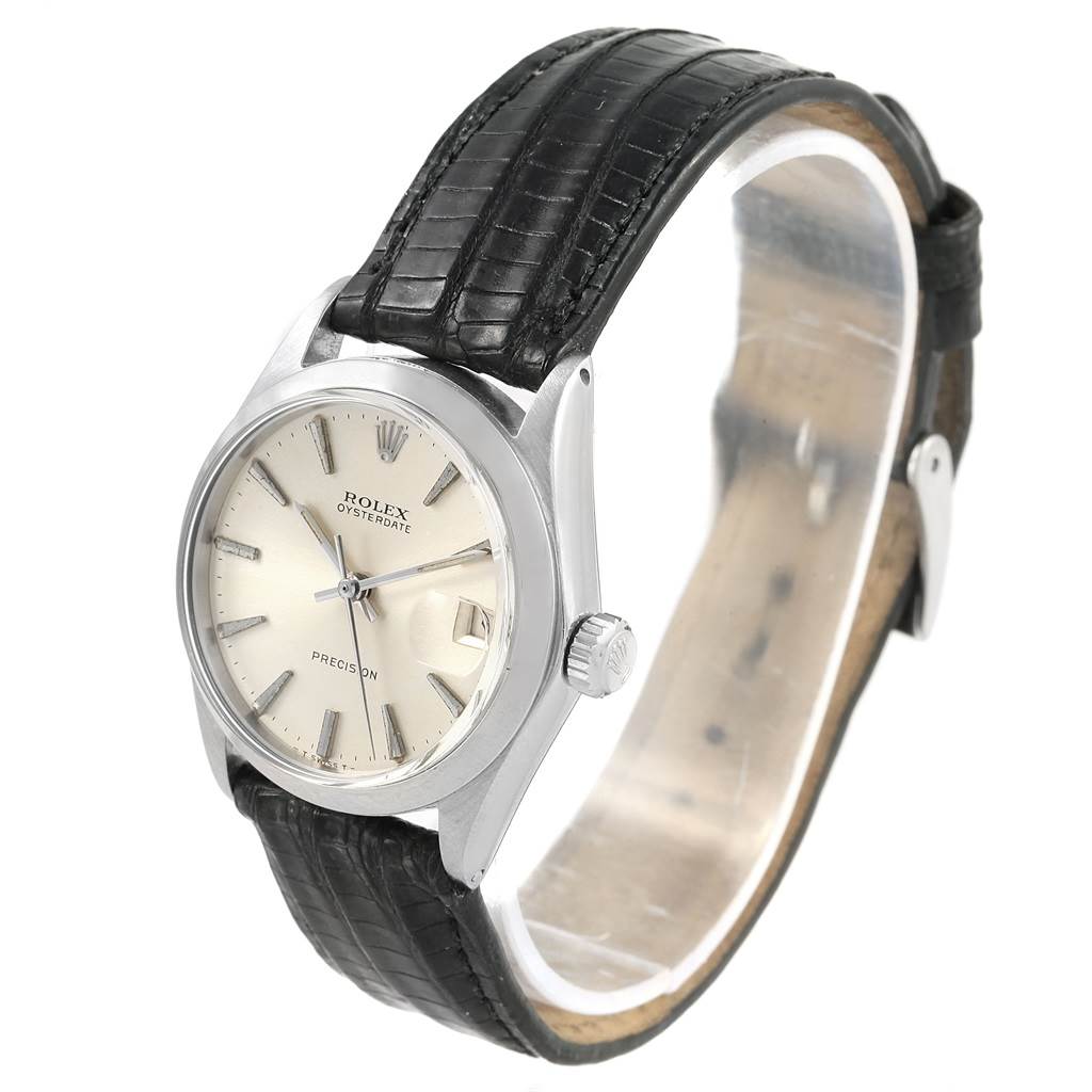 This image shows a Rolex Vintage Collection 6466 Men's Stainless Steel Silver Dial 6466 Men's Stainless Steel Silver Dial watch from a three-quarter angle, highlighting the face, bezel, crown, and leather strap.