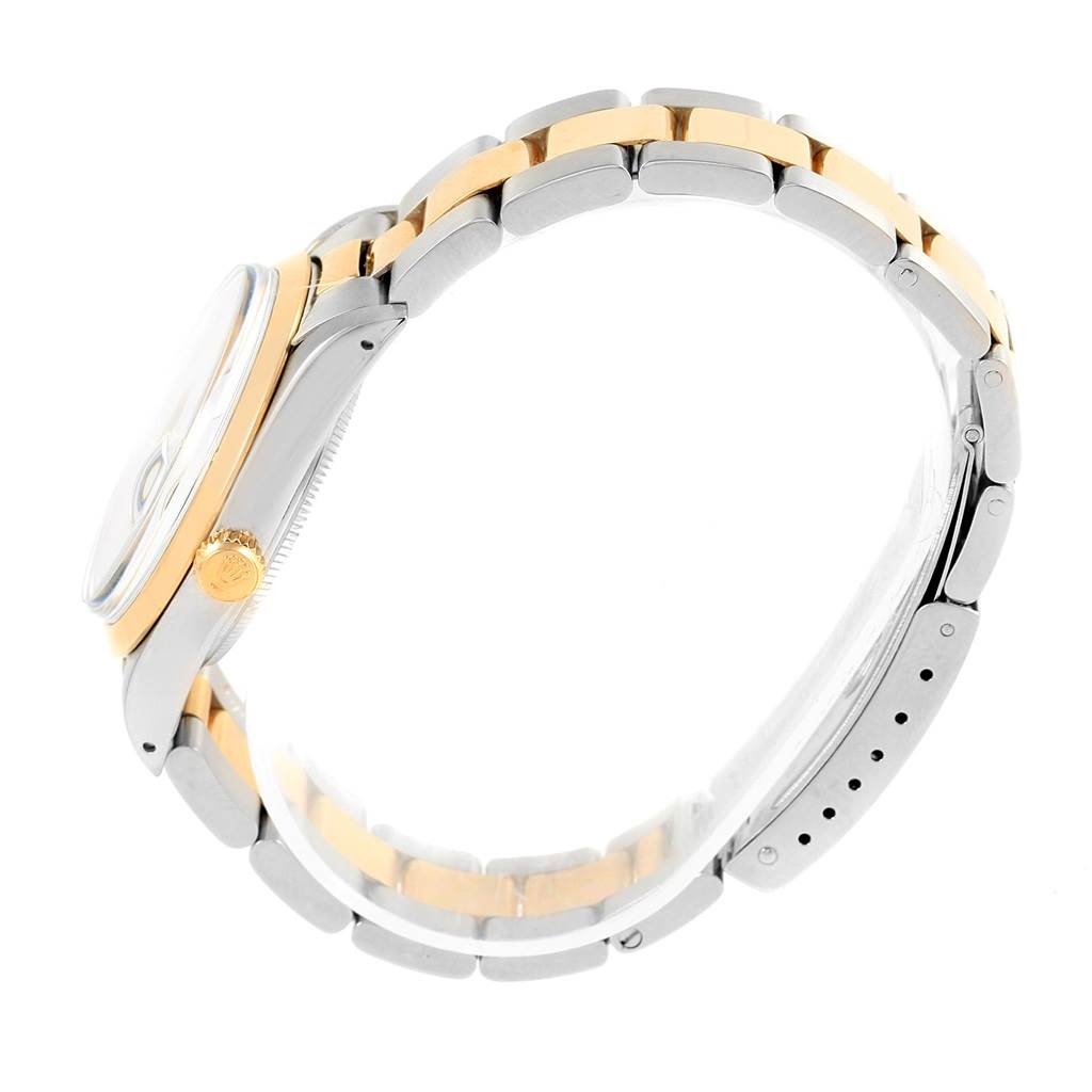 The image shows a side profile of the Rolex Vintage Collection 15003 Men's Steel and Gold (two tone) Blue Dial 15003 Men's Steel and Gold (two tone) Blue Dial model, highlighting the case, crown, and two-tone bracelet.