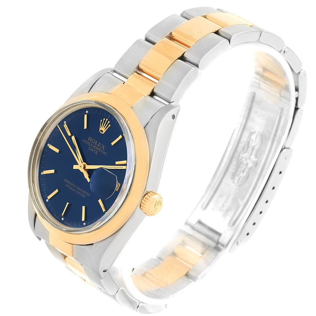 The watch is a Rolex Vintage Collection 15003 Men's Steel and Gold (two tone) Blue Dial 15003 Men's Steel and Gold (two tone) Blue Dial model shown at a side angle, highlighting its blue dial, gold bezel, and two-tone metal strap.