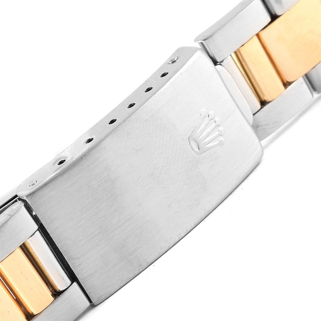 This image shows a close-up of the clasp and part of the bracelet of the Rolex Vintage Collection 15003 Men's Steel and Gold (two tone) Blue Dial 15003 Men's Steel and Gold (two tone) Blue Dial watch.