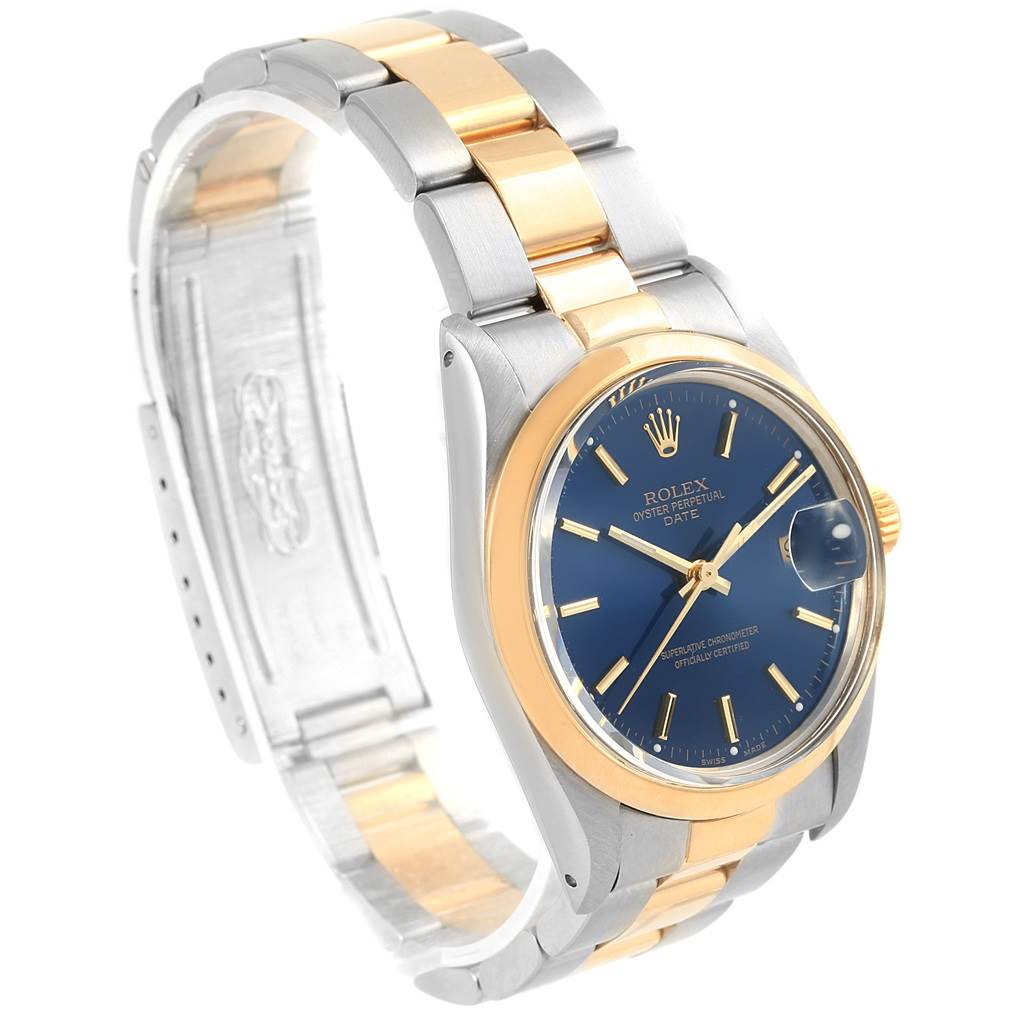 The image shows a Rolex Vintage Collection 15003 Men's Steel and Gold (two tone) Blue Dial 15003 Men's Steel and Gold (two tone) Blue Dial model from an angled, side view, highlighting its blue dial, gold bezel, and two-tone metal bracelet.