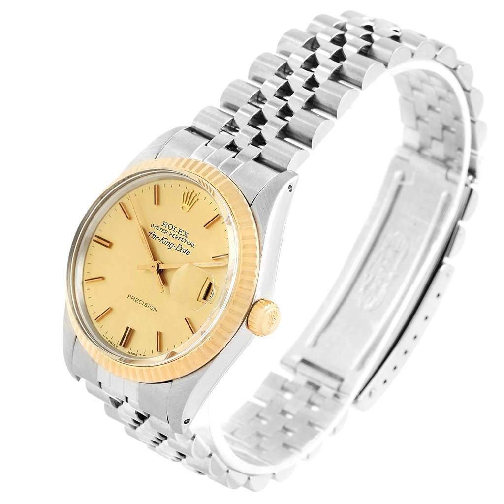 The Rolex Vintage Collection 5701 Men's Steel and Gold (two tone) Champagne Dial 5701 Men's Steel and Gold (two tone) Champagne Dial watch is shown at an angled view displaying its face, bezel, and bracelet.
